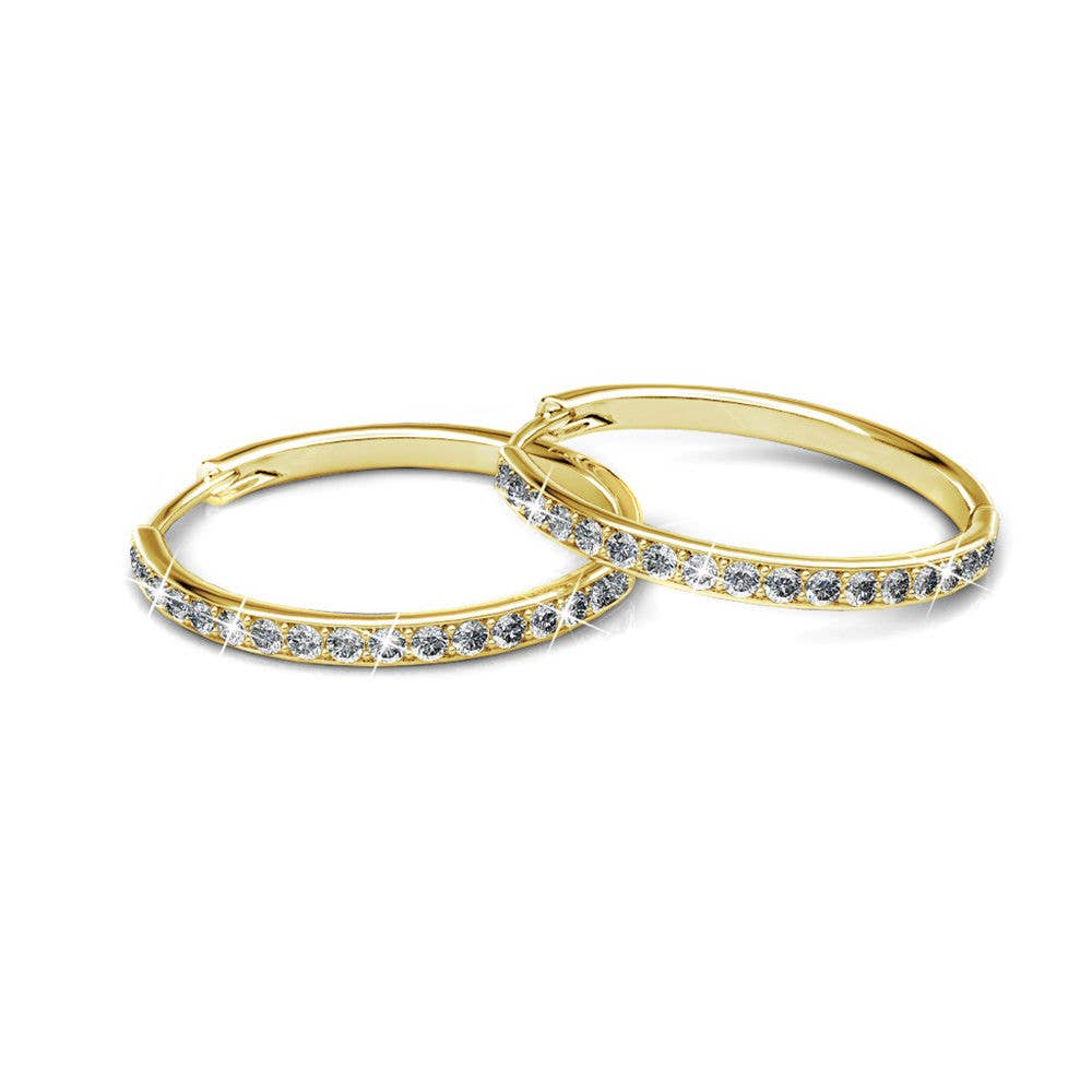 Elegante øreringe med guld og krystaller
